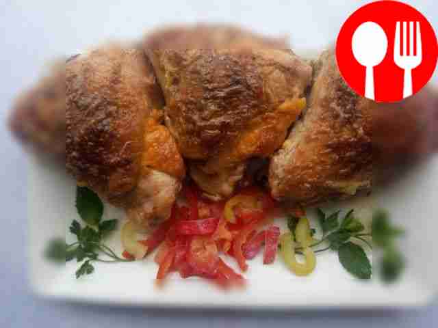 Appetizing chicken thighs stuffed with cheese