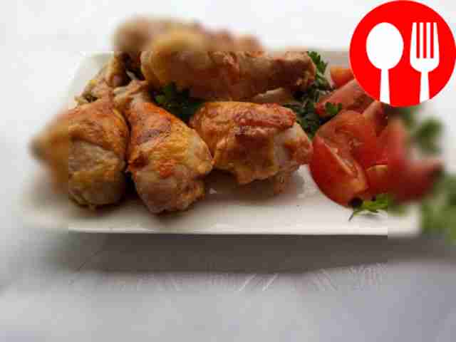 Fragrant chicken drumstick with cheese in the oven