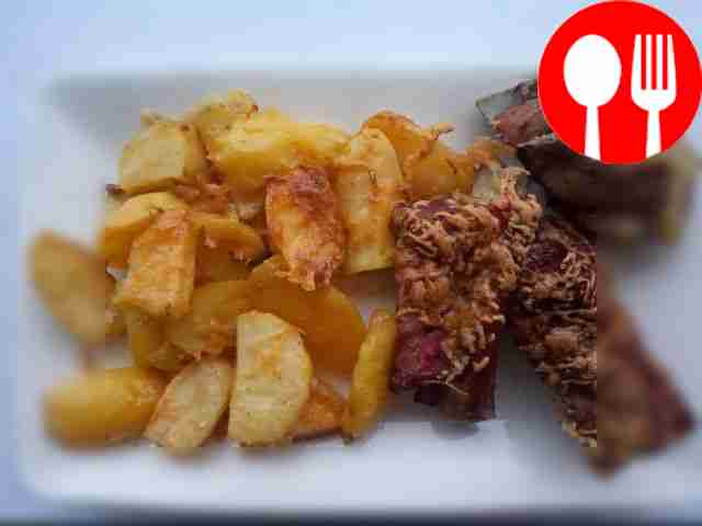 Fragrant pork ribs with potatoes in the oven