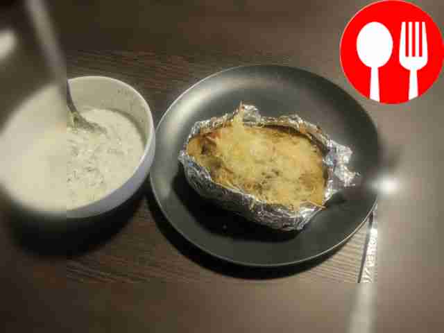 “Kroshka Potatoes” with chicken and mushrooms with garlic sauce