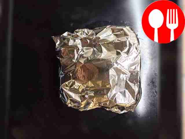 Заверните рыбу в фольгу и поместите в духовку,...