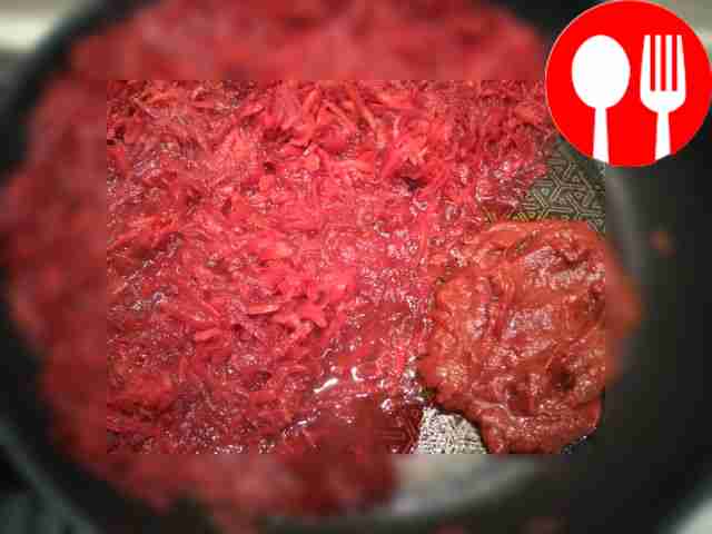 Add tomato paste and spices, cover with a lid...
