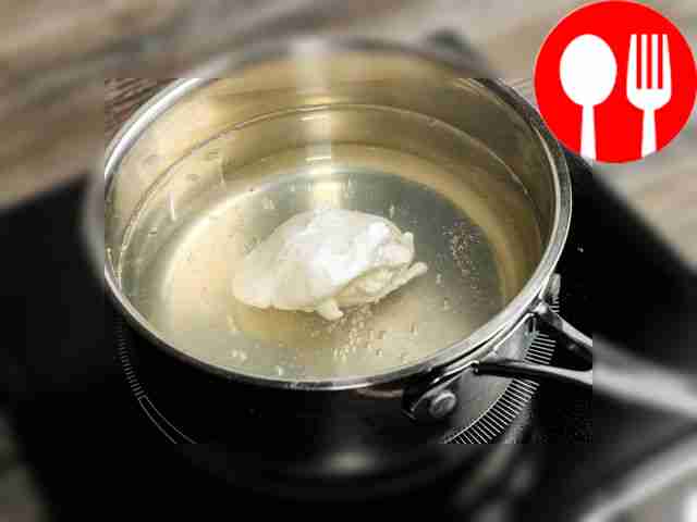Gently crack the egg into the water and cook...