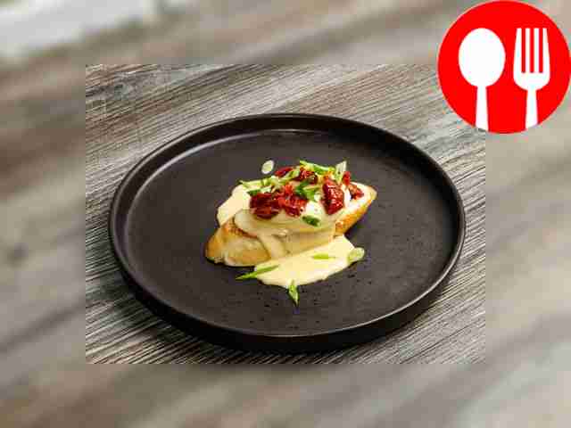 Pour hollandaise sauce over the top and...