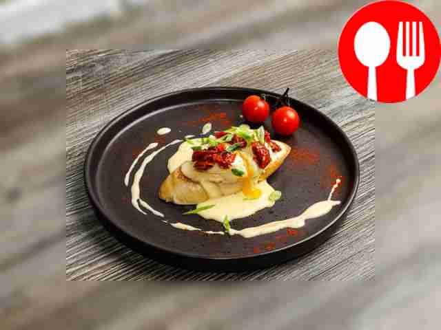 Add fried bacon slices to the dish. Place...