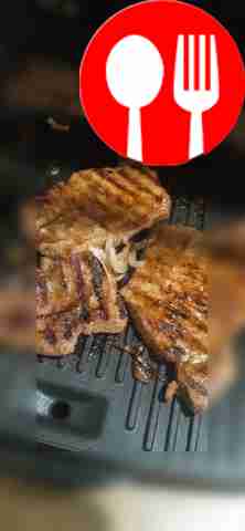 Grilled pork steaks with zucchini