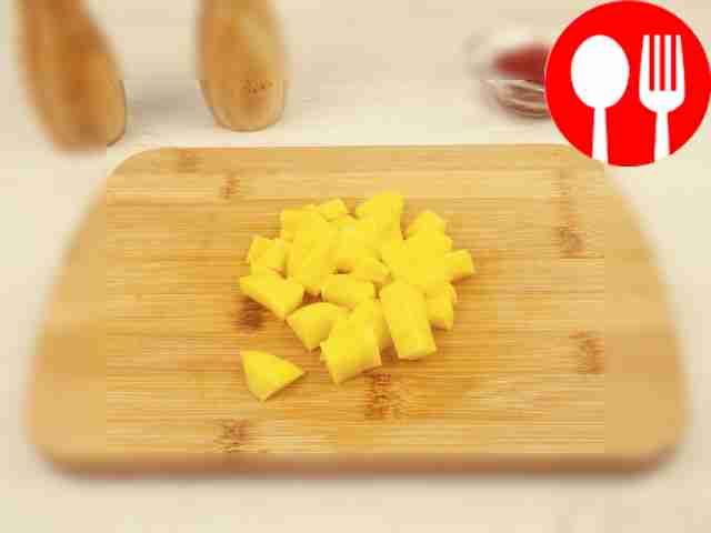 Coarsely chop the white cabbage and cut the...