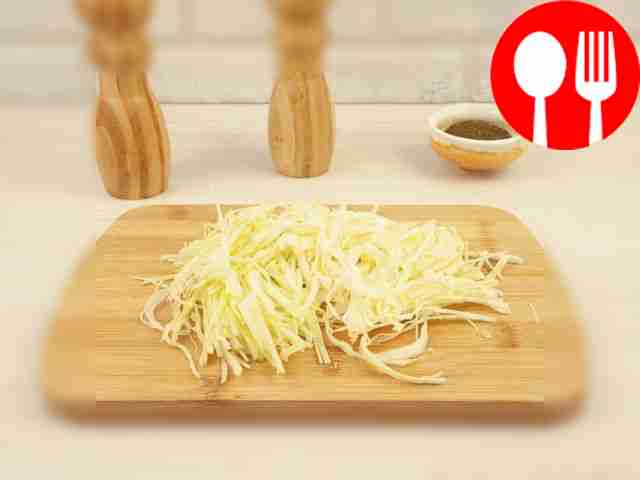 Chop the white cabbage - the slices should be...