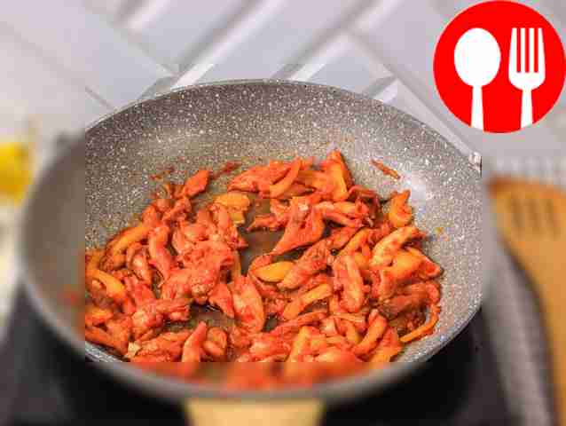 Add tomato paste and paprika to the pan. Salt...