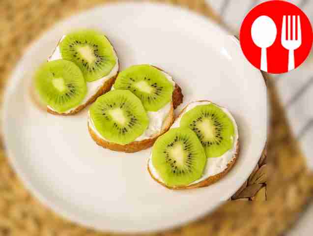 Place kiwi slices on toast.