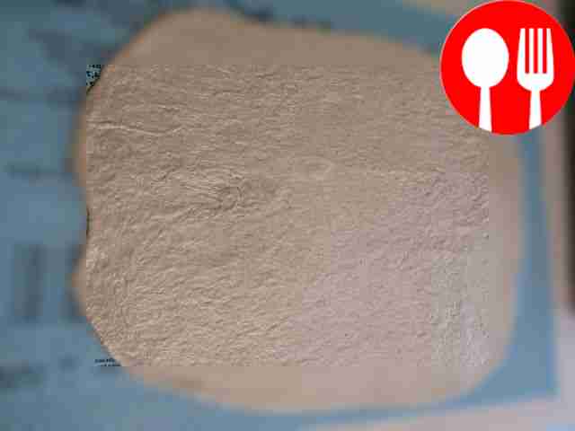 Roll out the risen dough into a layer.