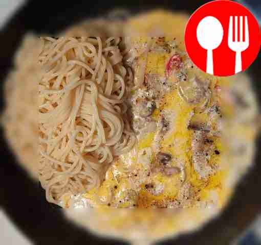 Transfer the spaghetti from the pan to the...