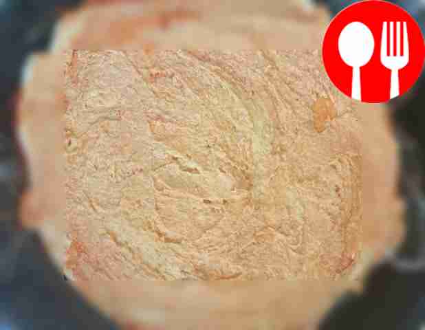 Roll out the dough into a round cake and place...