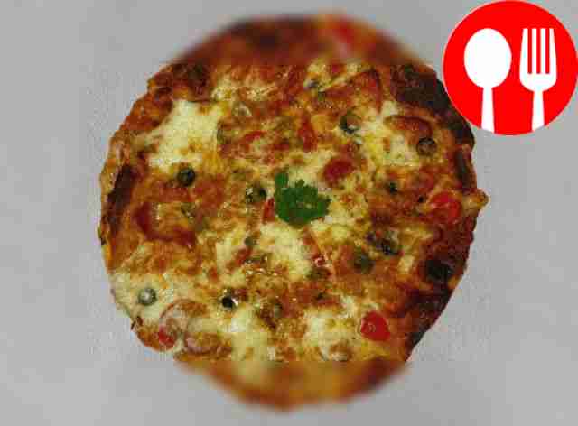 Serve pizza with fresh vegetables and your...