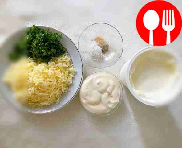 Grate the cheese on a fine grater. Chop the...