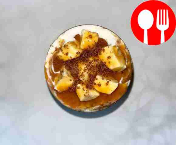 Decorate the dessert with biscuit crumbs and...