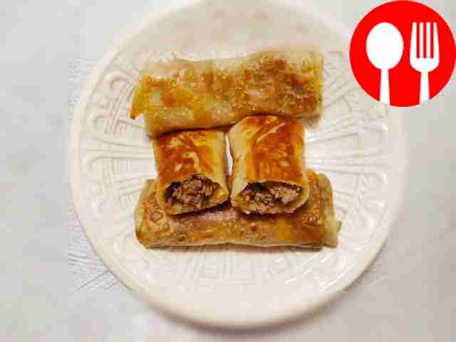 Румяные фаршированные блины с мясом