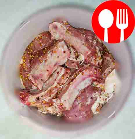 Cut the ribs into pieces, bone by bone. Pour...