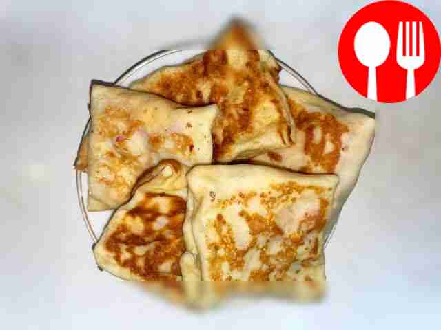 Juicy pancakes with cheese and sausage