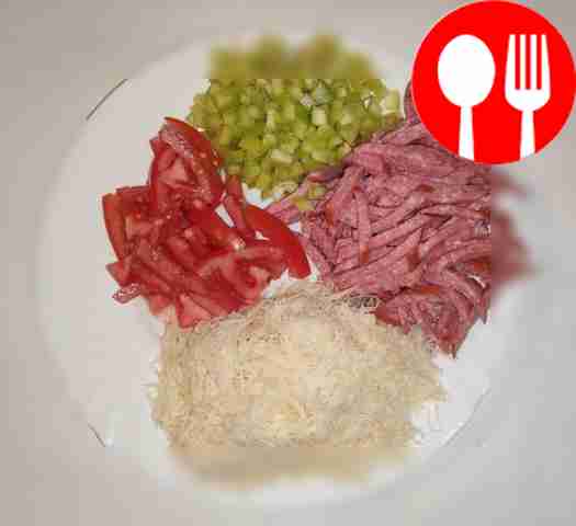 Cut the sausage into thin strips. Cut the...