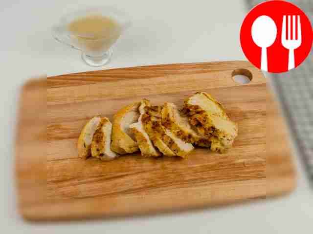 Add chicken fillet with seasonings to a...