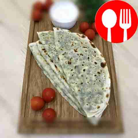 Kutaby with herbs and cheese