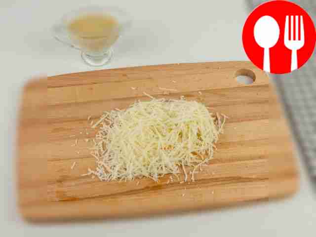 Grate the cheese on a fine grater.