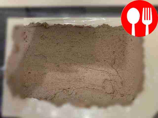 Spread cling film on the table and spoon the...