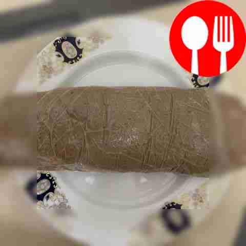 Carefully lifting the cling film, roll the...