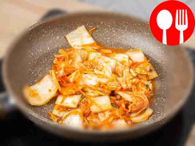 Fry the chopped kimchi in a deep frying pan...