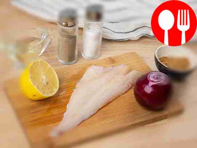 Wash and clean the fish. Wash the lemon and...