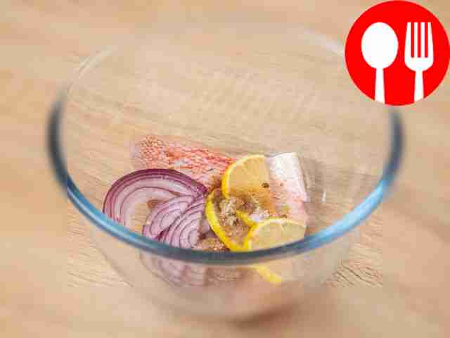 In a deep plate, mix lemon, coriander,...