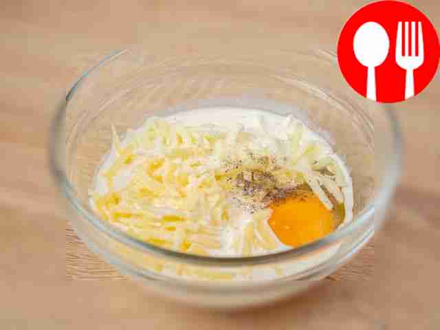 In a small bowl, combine grated cheeses, cream...