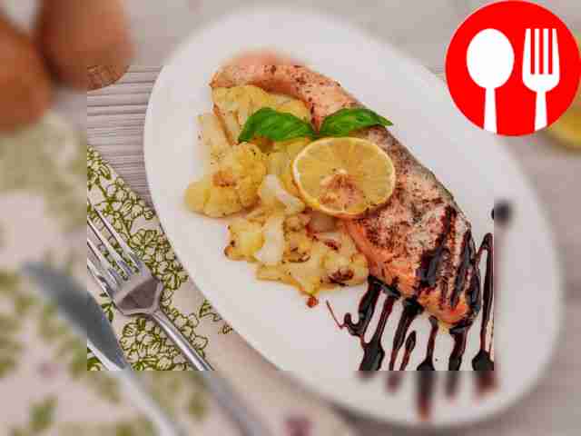 Salmon baked in the oven with cauliflower