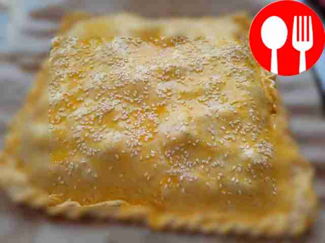 Roll out half of the dough, lay out the...