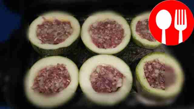 Place the zucchini rings in a baking dish and...