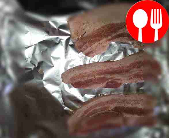 Apply seasoning to pork pieces.