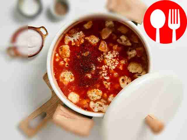 Prepare vegetable stew. Add tomato puree to...