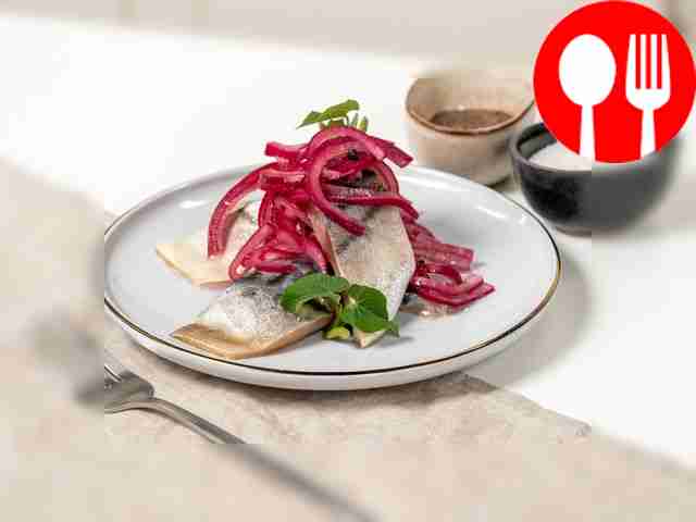 Place the finished marinated mackerel with...