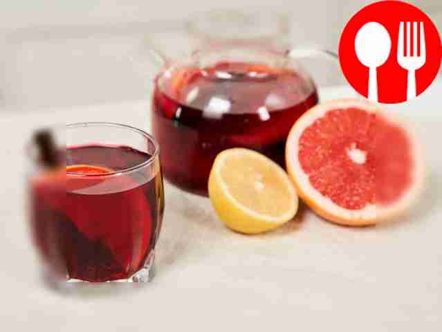 Pour hot red tea into glasses or cups. Garnish...