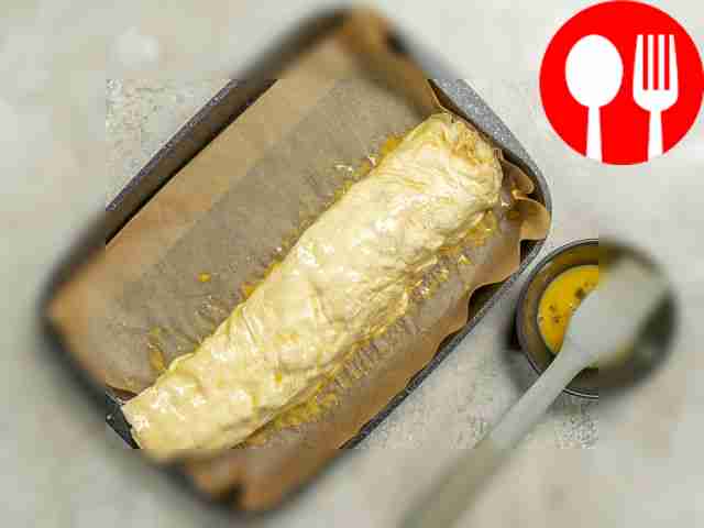 Bake the strudel in the oven. Place parchment...