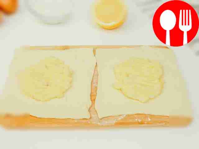 Cut the dough into squares. Place the lemon...