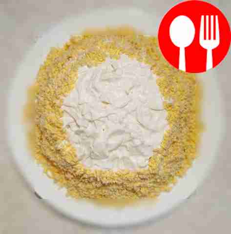 Hearty salad with crab sticks and smoked meats