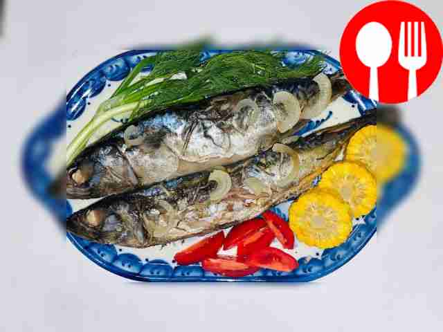 Grilled mackerel on fire