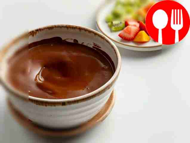 Chocolate fondue with assorted fruits