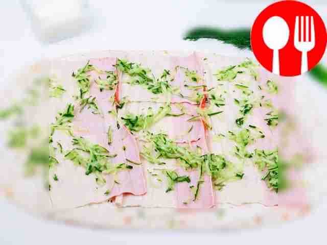 Place the next layer of unrolled crab sticks...