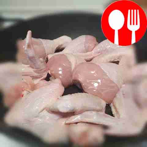 Place the chicken legs in a frying pan with a...