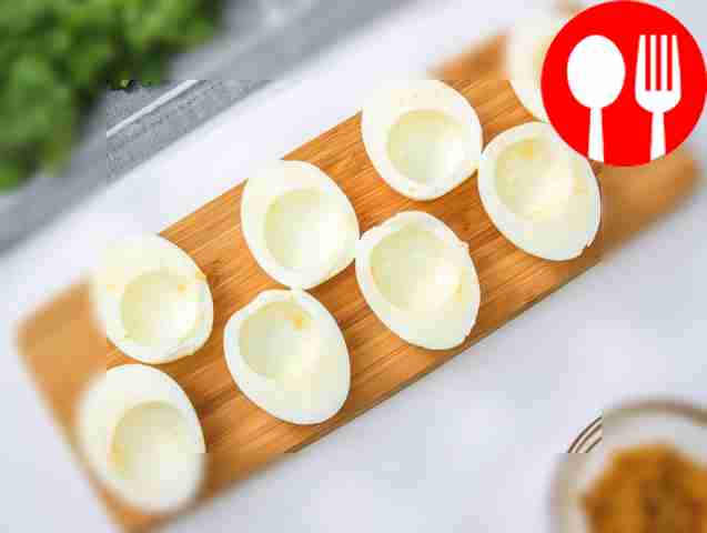 Carefully cut the eggs in half and separate the yolks.