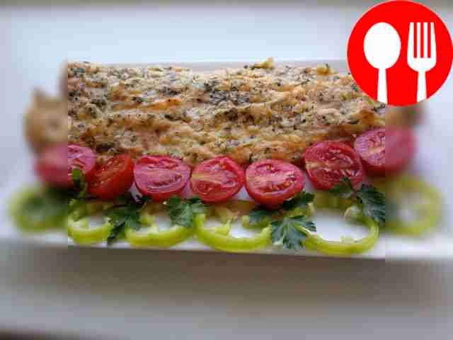 Place the fish on a flat plate and garnish it...