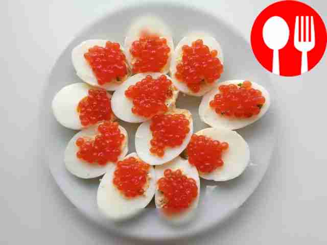 Delicious eggs with caviar